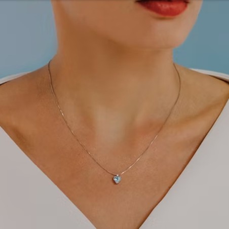 18kt white gold Comete necklace with aquamarine and diamond