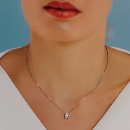 18kt white gold Comete necklace with aquamarine and diamond