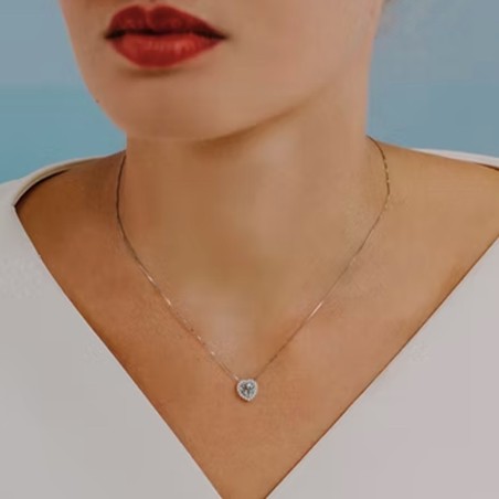 18kt white gold Comete necklace with aquamarine and diamond